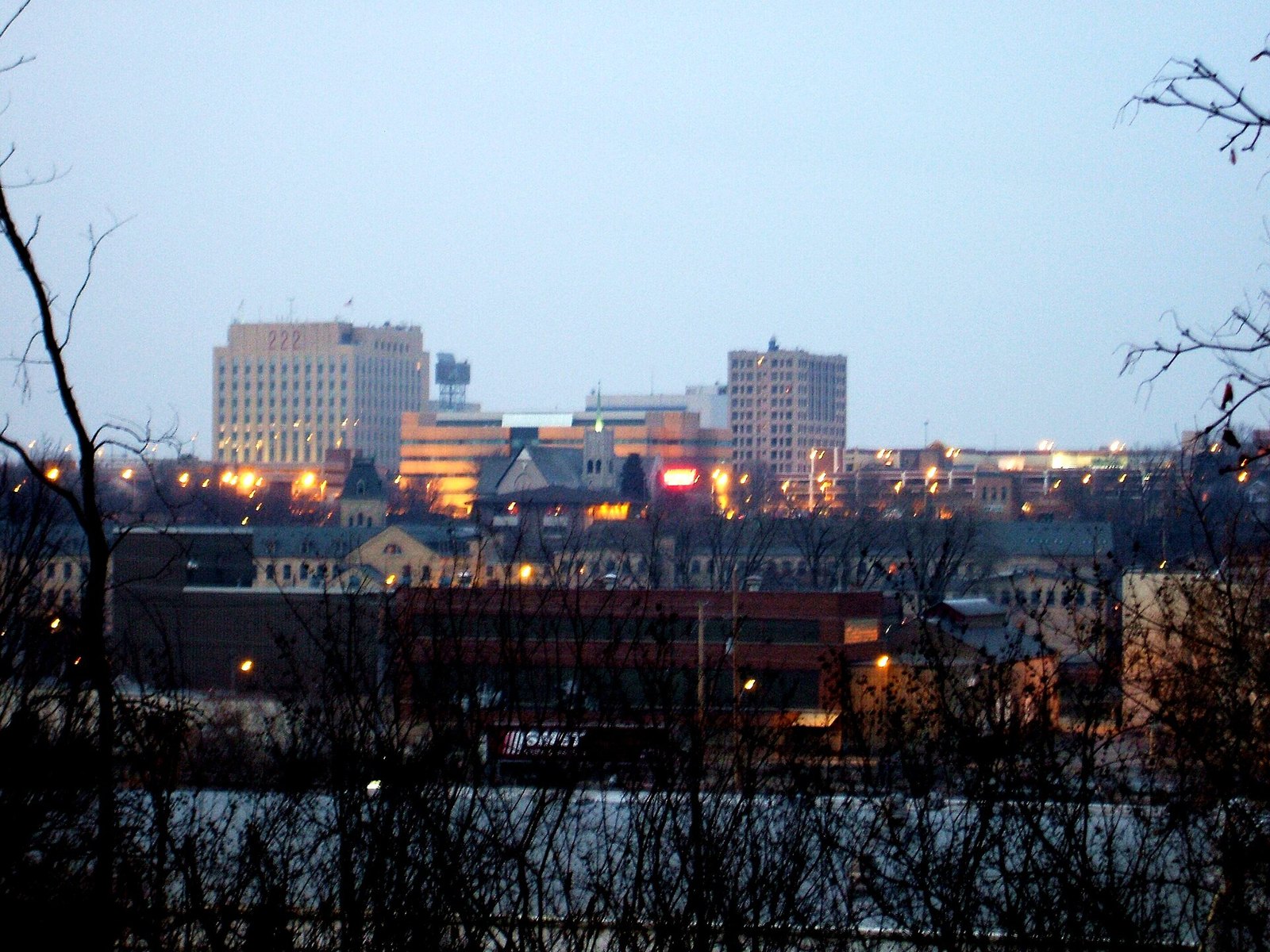 Appleton skyline at dusk beside the Fox River in Appleton, Wisconsin