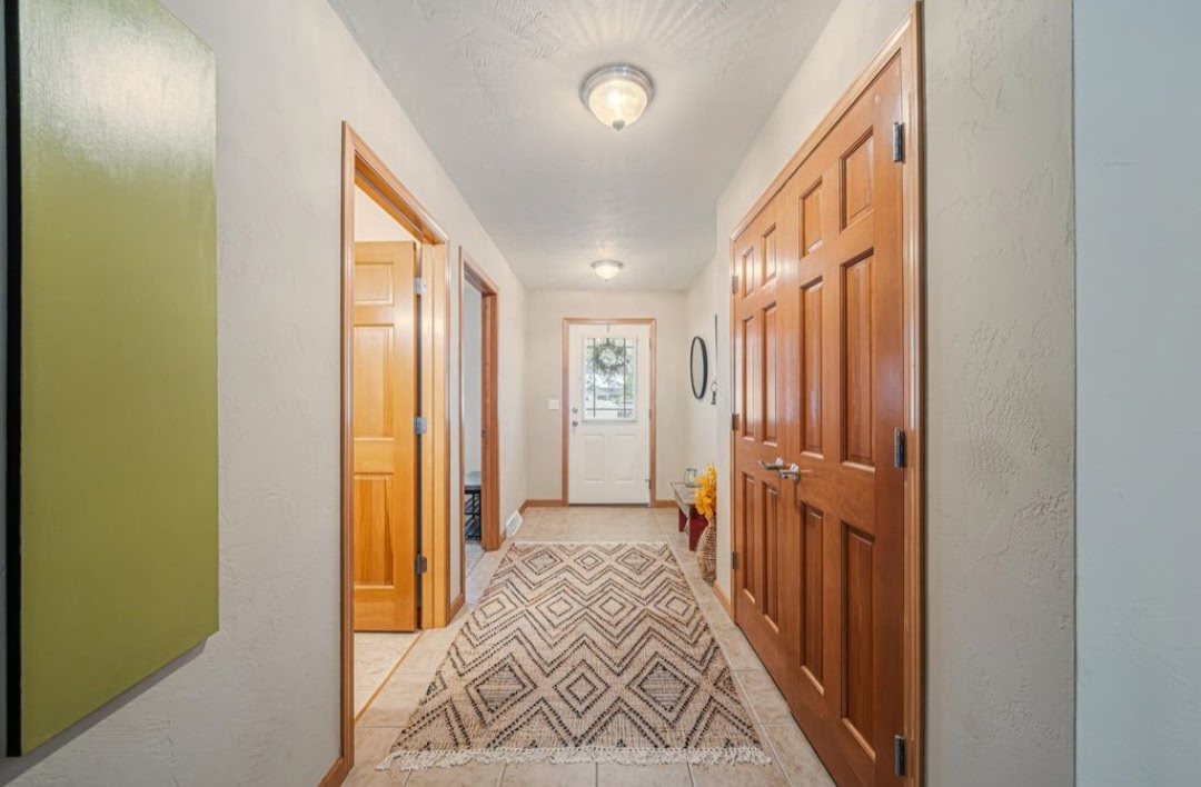 Entry hallway with wood doors, 646 S Lincoln St, Hortonville WI