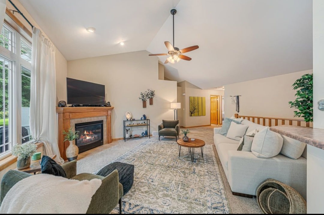 Living room with vaulted ceiling and gas fireplace, 646 S Lincoln St, Hortonville WI