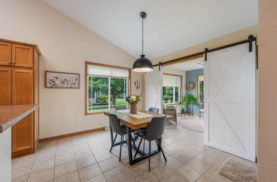 Dining area with sliding barn door, 646 S Lincoln St, Hortonville WI