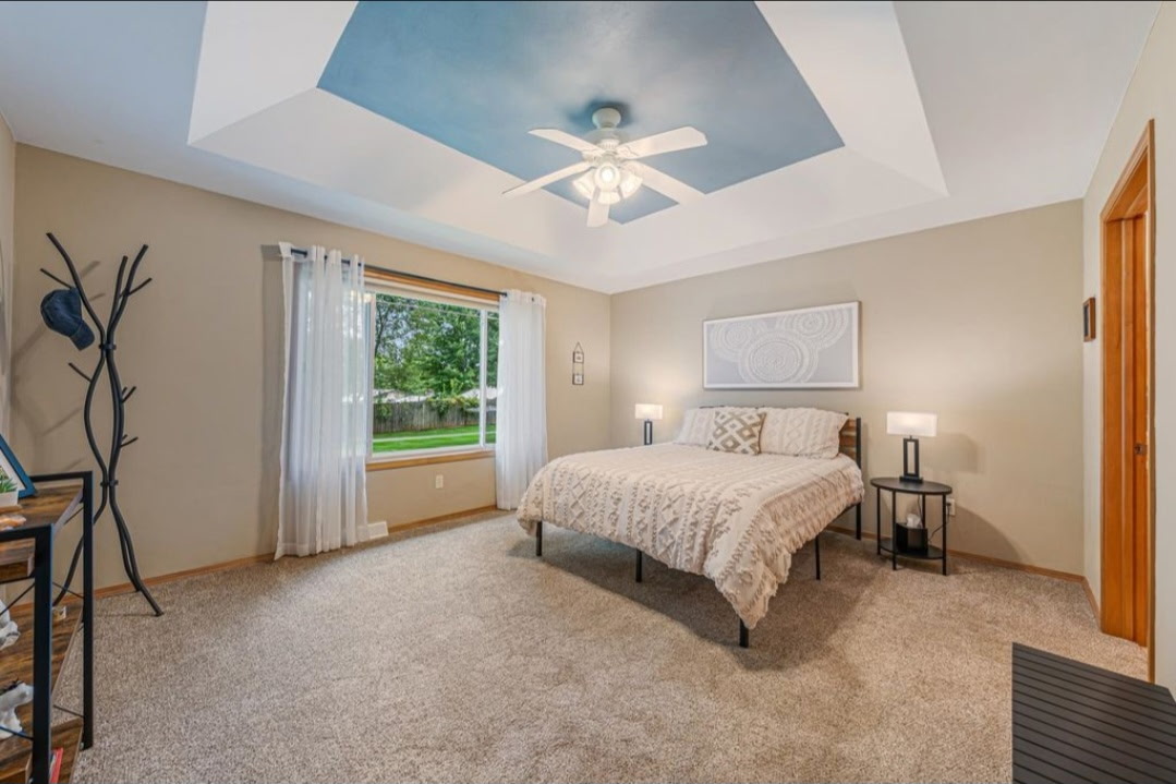 Primary bedroom with tray ceiling, 646 S Lincoln St, Hortonville WI