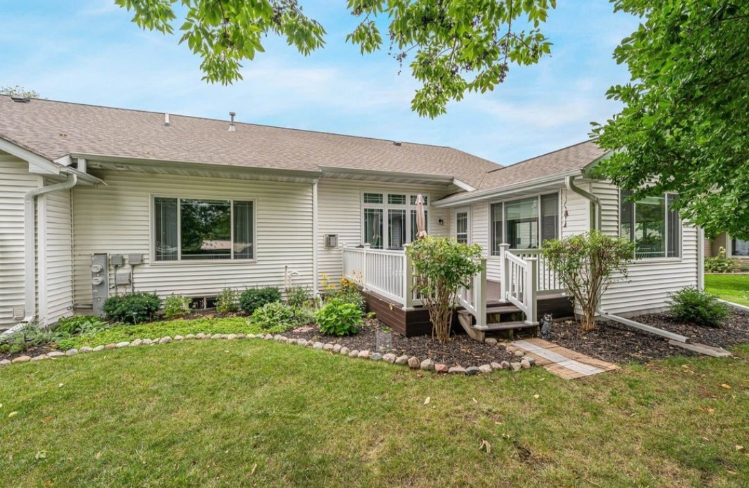 Rear exterior with landscaping and deck, 646 S Lincoln St, Hortonville WI