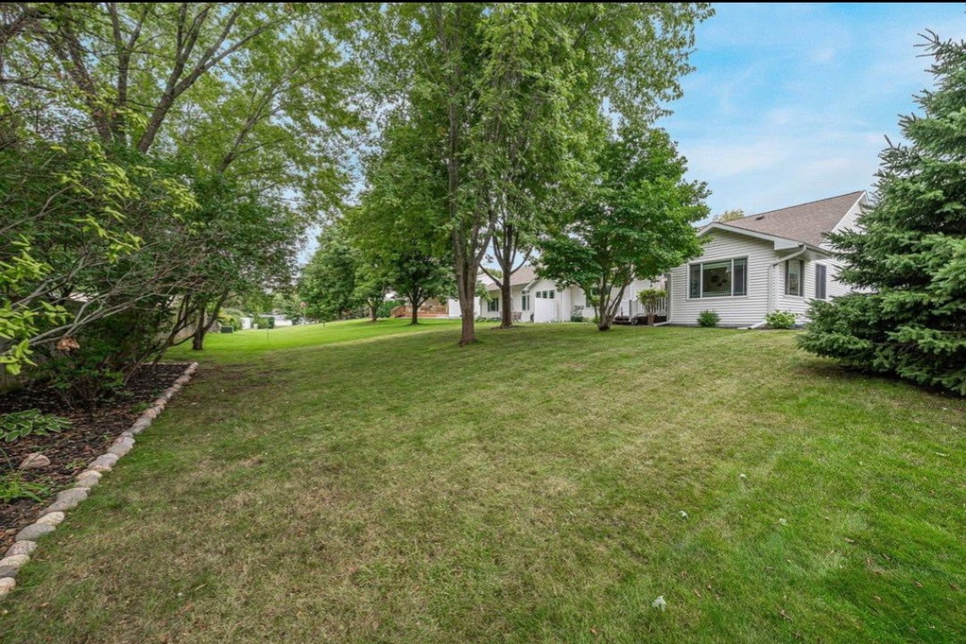 Backyard lawn with mature trees, 646 S Lincoln St, Hortonville WI
